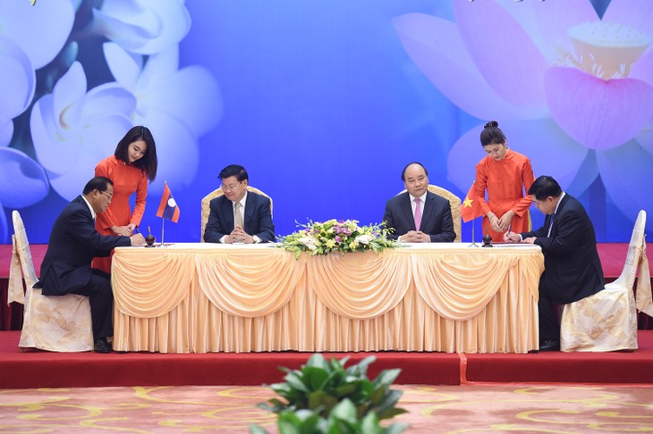 Laotische Presse schätzt Erfolge der 39. Sitzung der Regierungskommission Vietnams und Laos - ảnh 1